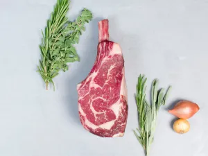 DRY AGED BONE-IN RIBEYE STEAK
